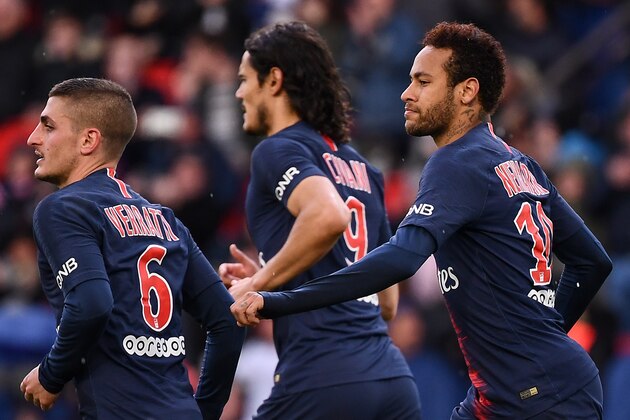 Paris Saint-Germain's Brazilian forward Neymar (R) celebrates after scoring a goal with Paris Saint-Germain's Italian midfielder Marco Verratti (L) and Paris Saint-Germain's Uruguayan forward Edinson Cavani (C) during the French L1 football match between Paris Saint-Germain (PSG) and OGC Nice at the Parc des Princes stadium in Paris on May 4, 2019. (Photo by Anne-Christine POUJOULAT / AFP)        (Photo credit should read ANNE-CHRISTINE POUJOULAT/AFP/Getty Images)