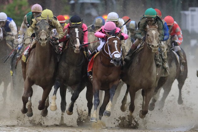 LOUISVILLE, KENTUCKY - MAY 04: Country House #20, ridden by jockey Flavien Prat, War of Will #1, ridden by jockey Tyler Gaffalione , Maximum Security #7, ridden by jockey Luis Saez and Code of Honor #13, ridden by jockey John Velazquez fight for position in the final turn during the 145th running of the Kentucky Derby at Churchill Downs on May 04, 2019 in Louisville, Kentucky. (Photo by Andy Lyons/Getty Images)