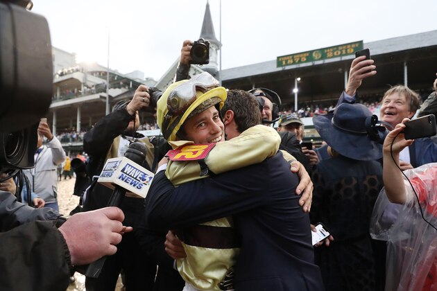 LOUISVILLE, KENTUCKY - MAY 04: Jockey Flavien Prat celebrates with the connections of Country House #20 after winning the 145th running of the Kentucky Derby at Churchill Downs on May 04, 2019 in Louisville, Kentucky. (Photo by Rob Carr/Getty Images)