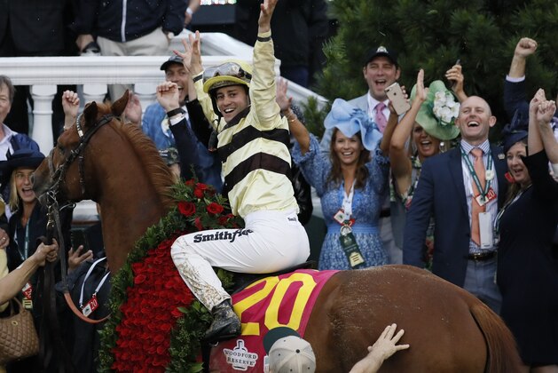 Flavien Prat celebrates after riding Country House to victory during the 145th running of the Kentucky Derby horse race at Churchill Downs Saturday, May 4, 2019, in Louisville, Ky. (AP Photo/John Minchillo)