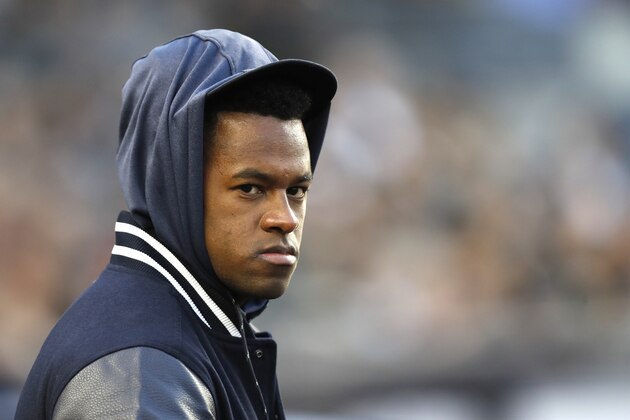Injured New York Yankees starting pitcher Luis Severino watches from the dugout during a major league baseball game against the Boston Red Sox, Wednesday, April 17, 2019, in New York. (AP Photo/Kathy Willens)