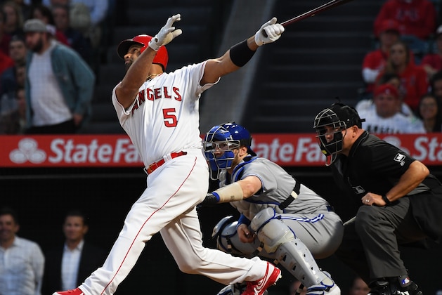 ANAHEIM, CA - MAY 01: Albert Pujols #5 of the Los Angeles Angels of Anaheim hits a sacrifice fly for RBI 1,998 of his career in the first inning of the game against the Toronto Blue Jays at Angel Stadium of Anaheim on May 1, 2019 in Anaheim, California. (Photo by Jayne Kamin-Oncea/Getty Images)