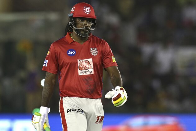 Kings XI Punjab's Chris Gayle leaves the field after being dismissed during the VIVO IPL T20 cricket match between Kings XI Punjab and Kolkata Knight Riders in Mohali, India, Friday, May 3, 2019. (AP Photo/Surjeet Yadav)