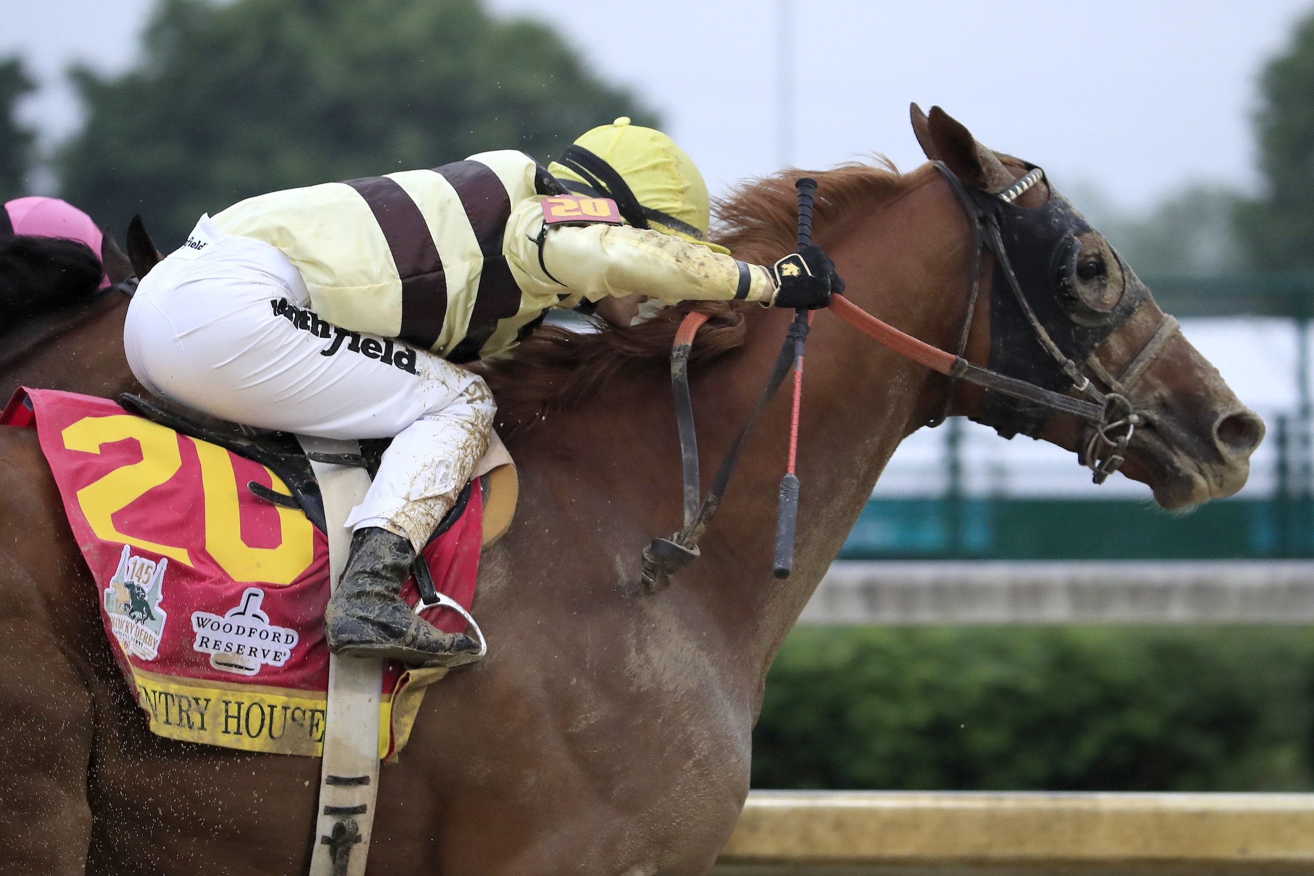 LOUISVILLE, KENTUCKY - MAY 04: Country House #20, ridden by jockey Flavien Prat, heads down the stretch on his way to winning the 145th running of the Kentucky Derby at Churchill Downs on May 04, 2019 in Louisville, Kentucky. Country House #20 was declared the winner after a stewards review disqualified Maximum Security #7. (Photo by Andy Lyons/Getty Images)