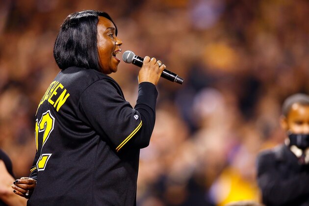 PITTSBURGH, PA - OCTOBER 07:  Petrina McCutchen, mother of Andrew McCutchen #22 of the Pittsburgh Pirates, sings the national anthem prior to the National League Wild Card game between the Pittsburgh Pirates and the Chicago Cubs at PNC Park on October 7, 2015 in Pittsburgh, Pennsylvania.  (Photo by Jared Wickerham/Getty Images)