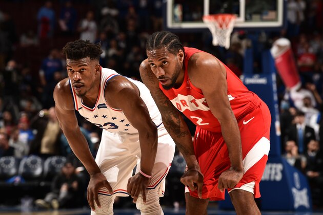 PHILADELPHIA, PA - MAY 5: Jimmy Butler #23 of the Philadelphia 76ers and Kawhi Leonard #2 of the Toronto Raptors looks on during Game Four of the Eastern Conference Semifinals of the 2019 NBA Playoffs on May 5, 2019 at the Wells Fargo Center in Philadelphia, Pennsylvania NOTE TO USER: User expressly acknowledges and agrees that, by downloading and/or using this Photograph, user is consenting to the terms and conditions of the Getty Images License Agreement. Mandatory Copyright Notice: Copyright 2019 NBAE (Photo by David Dow/NBAE via Getty Images)