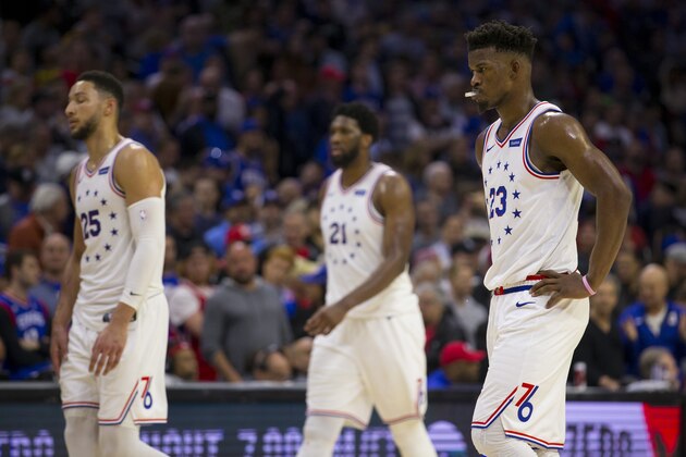 PHILADELPHIA, PA - MAY 05: Ben Simmons #25, Joel Embiid #21, and Jimmy Butler #23 of the Philadelphia 76ers walk to the bench during a timeout against the Toronto Raptors in the fourth quarter of Game Four of the Eastern Conference Semifinals at the Wells Fargo Center on May 5, 2019 in Philadelphia, Pennsylvania. The Raptors defeated the 76ers 101-96. NOTE TO USER: User expressly acknowledges and agrees that, by downloading and or using this photograph, User is consenting to the terms and conditions of the Getty Images License Agreement. (Photo by Mitchell Leff/Getty Images)