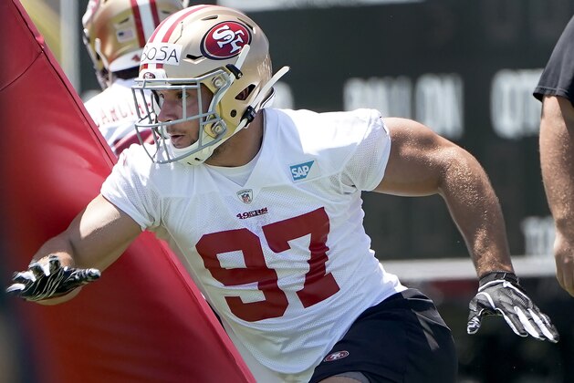 San Francisco 49ers first-round draft pick defensive lineman Nick Bosa (97) works on a drill during the NFL football team's rookie minicamp in Santa Clara, Calif., Friday, May 3, 2019. (AP Photo/Tony Avelar)