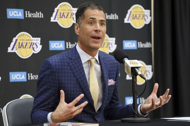 FILE - In this July 11, 2018, file photo, Los Angeles Lakers general manager Rob Pelinka speaks at a news conference at the NBA basketball team's headquarters in El Segundo, Calif. The  Lakers say they have mutually agreed to part ways with coach Luke Walton after three losing seasons. Pelinka announced Walton's departure Friday, April 12, 2019. (AP Photo/Reed Saxon, File)
