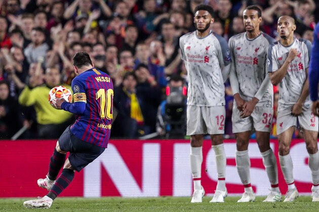 BARCELONA, SPAIN - MAY 1: (L-R) Lionel Messi of FC Barcelona, Joe Gomez of Liverpool FC, Joel Matip of Liverpool FC, Fabinho of Liverpool FC scores the 2nd goal to make it 3-0 during the UEFA Champions League  match between FC Barcelona v Liverpool at the Camp Nou on May 1, 2019 in Barcelona Spain (Photo by David S. Bustamante/Soccrates/Getty Images)