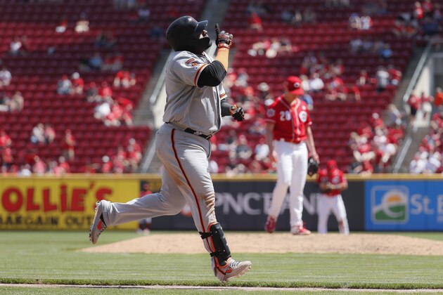 San Francisco Giants' Pablo Sandoval runs the bases after hitting a three-run home run off Cincinnati Reds starting pitcher Anthony DeSclafani in the sixth inning of a baseball game, Monday, May 6, 2019, in Cincinnati. (AP Photo/John Minchillo)