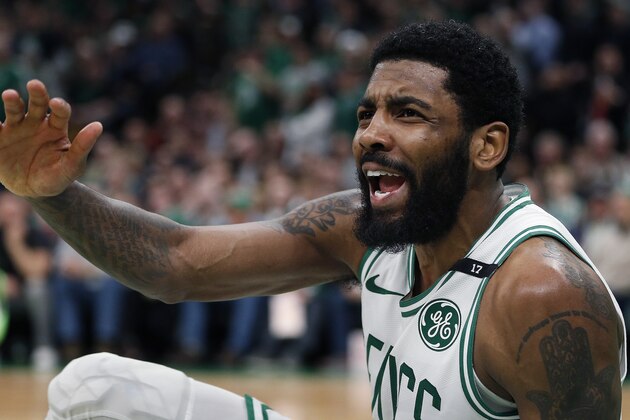 Boston Celtics' Kyrie Irving looks for a foul call against the Milwaukee Bucks after attempting a shot during the second half of Game 3 of a second round NBA basketball playoff series in Boston, Friday, May 3, 2019. (AP Photo/Michael Dwyer)