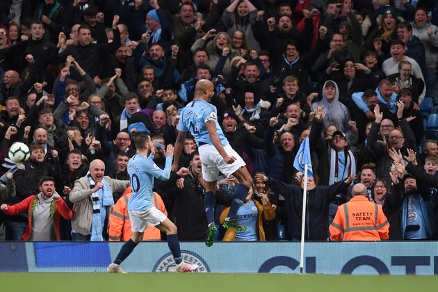 MANCHESTER, ENGLAND - MAY 06: Vincent Kompany of Manchester City celebrates after scoring his team's first goal with Bernardo Silva of Manchester City during the Premier League match between Manchester City and Leicester City at Etihad Stadium on May 06, 2019 in Manchester, United Kingdom. (Photo by Laurence Griffiths/Getty Images)