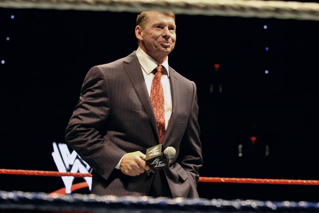 FILE - In this Oct. 30, 2010 file photo, WWE chairman and CEO Vince McMahon speaks to an audience during a WWE fan appreciation event in Hartford, Conn.   WWE's 'Raw' set out to be a special kind of wrestling show from its birth on Jan. 11, 1993.