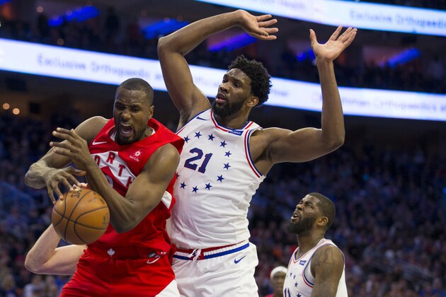 PHILADELPHIA, PA - MAY 05: Serge Ibaka #9 of the Toronto Raptors attempts to rebound the ball against Joel Embiid #21 of the Philadelphia 76ers in the fourth quarter of Game Four of the Eastern Conference Semifinals at the Wells Fargo Center on May 5, 2019 in Philadelphia, Pennsylvania. The Raptors defeated the 76ers 101-96. NOTE TO USER: User expressly acknowledges and agrees that, by downloading and or using this photograph, User is consenting to the terms and conditions of the Getty Images License Agreement. (Photo by Mitchell Leff/Getty Images)