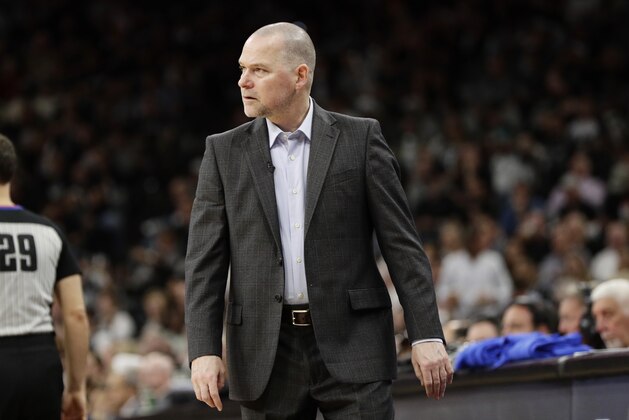 Denver Nuggets head coach Michael Malone during the first half of Game 3 of an NBA basketball playoff series against the San Antonio Spurs, in San Antonio, Thursday, April 18, 2019. San Antonio won 118-108. (AP Photo/Eric Gay)