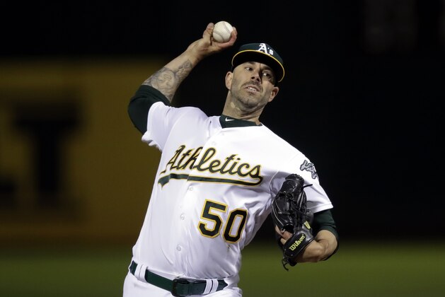 Oakland Athletics pitcher Mike Fiers works against the Cincinnati Reds during the first inning of a baseball game Tuesday, May 7, 2019, in Oakland, Calif. (AP Photo/Ben Margot)