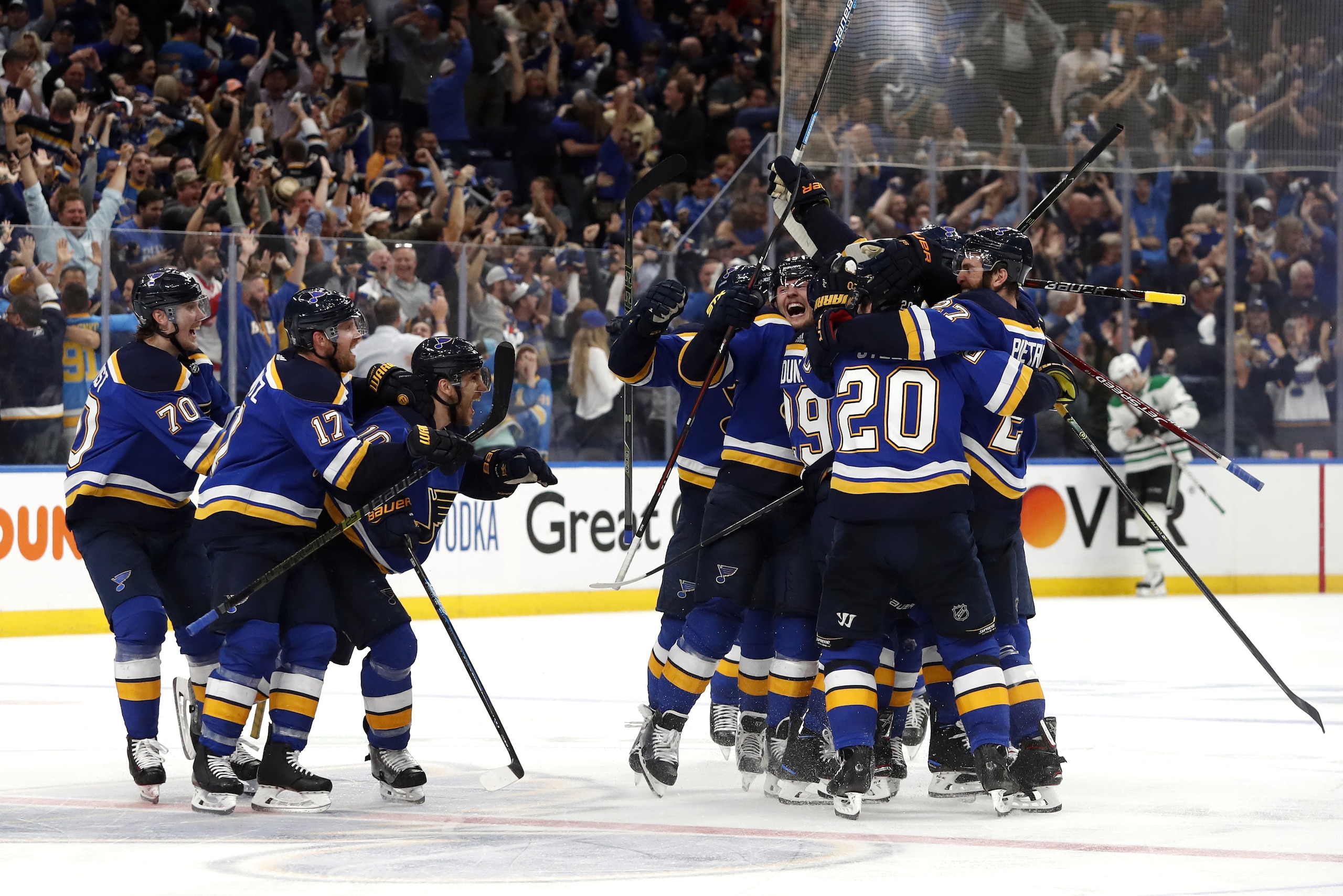 St. Louis Blues celebrate after defeating the Dallas Stars in double overtime in Game 7 of an NHL second-round hockey playoff series Tuesday, May 7, 2019, in St. Louis. The Blues won 2-1. (AP Photo/Jeff Roberson)