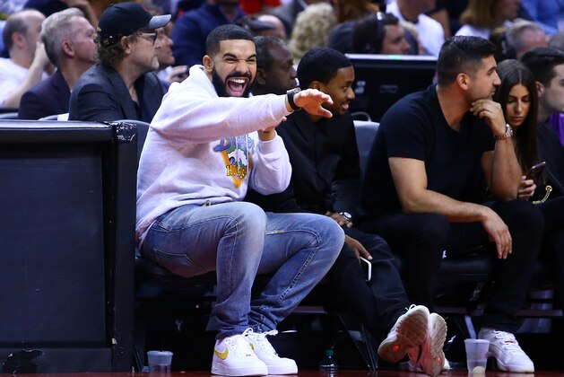 TORONTO, ON - MAY 07:  Singer Drake reacts in the second half during Game Five of the second round of the 2019 NBA Playoffs between the Philadelphia 76ers and the Toronto Raptors at Scotiabank Arena on May 7, 2019 in Toronto, Canada.  NOTE TO USER: User expressly acknowledges and agrees that, by downloading and or using this photograph, User is consenting to the terms and conditions of the Getty Images License Agreement.  (Photo by Vaughn Ridley/Getty Images)
