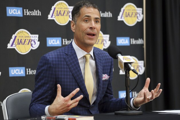 FILE - In this July 11, 2018, file photo, Los Angeles Lakers general manager Rob Pelinka speaks at a news conference at the NBA basketball team's headquarters in El Segundo, Calif. The  Lakers say they have mutually agreed to part ways with coach Luke Walton after three losing seasons. Pelinka announced Walton's departure Friday, April 12, 2019. (AP Photo/Reed Saxon, File)