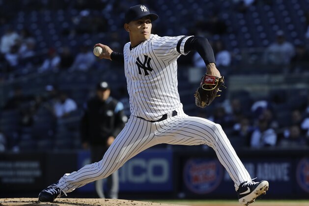 New York Yankees' Jonathan Loaisiga delivers a pitch during the second inning of a baseball game against the Detroit Tigers Wednesday, April 3, 2019, in New York. (AP Photo/Frank Franklin II)