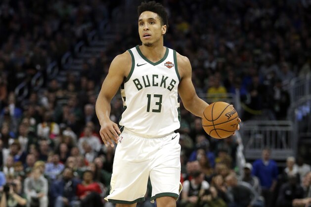 Milwaukee Bucks' Malcolm Brogdon dribbles during the second half of an NBA basketball game against the Toronto Raptors Saturday, Jan. 5, 2019, in Milwaukee. The Raptors won 123-116. (AP Photo/Aaron Gash)