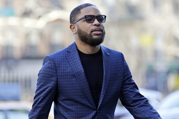 Business manager Christian Dawkins arrives to court in New York, Tuesday, March 5, 2019. Federal prosecutors have recommended multi-year prison sentences for Dawkins and two other men convicted of fraud for channeling secret payments to the families of top-tier basketball recruits to influence where the players went to school. (AP Photo/Seth Wenig)