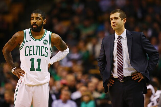 BOSTON, MA - DECEMBER 13:  Kyrie Irving #11 of the Boston Celtics and head coach Brad Stevens look on during the second half against the Denver Nuggets at TD Garden on December 13, 2017 in Boston, Massachusetts.  (Photo by Tim Bradbury/Getty Images)