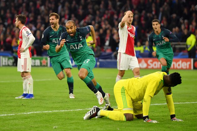 AMSTERDAM, NETHERLANDS - MAY 08: Lucas Moura of Tottenham Hotspur celebrates after scoring his team's third goal as Andre Onana of Ajax reacts during the UEFA Champions League Semi Final second leg match between Ajax and Tottenham Hotspur at the Johan Cruyff Arena on May 08, 2019 in Amsterdam, Netherlands. (Photo by Dan Mullan/Getty Images )