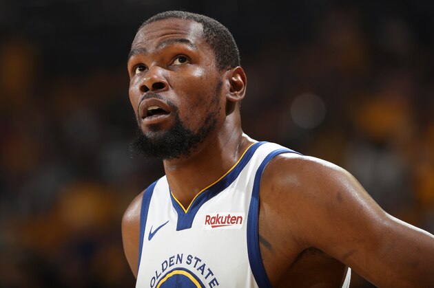 OAKLAND, CA - MAY 8: Kevin Durant #35 of the Golden State Warriors looks on against the Houston Rockets during Game Five of the Western Conference Semifinals of the 2019 NBA Playoffs on May 8, 2019 at ORACLE Arena in Oakland, California. NOTE TO USER: User expressly acknowledges and agrees that, by downloading and/or using this photograph, user is consenting to the terms and conditions of Getty Images License Agreement. Mandatory Copyright Notice: Copyright 2019 NBAE (Photo by Joe Murphy/NBAE via Getty Images)