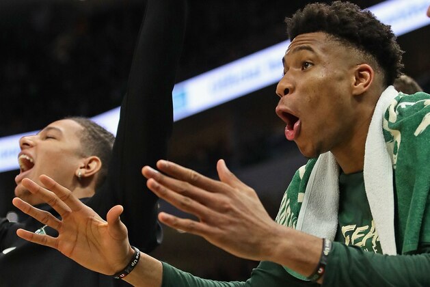 MILWAUKEE, WISCONSIN - MAY 08: Giannis Antetokounmpo #34 of the Milwaukee Bucks reacts on the bench after a teammate dunked against the Boston Celtics at Fiserv Forum on May 08, 2019 in Milwaukee, Wisconsin. The Bucks defeated the Celtics 116-91. NOTE TO USER: User expressly acknowledges and agrees that, by downloading and or using this photograph, User is consenting to the terms and conditions of the Getty Images License Agreement. (Photo by Jonathan Daniel/Getty Images)