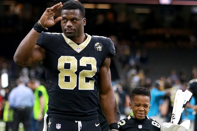 NEW ORLEANS, LOUISIANA - DECEMBER 30: Benjamin Watson #82 of the New Orleans Saints walks off the field with his son after NFL game against the Carolina Panthers at the Mercedes-Benz Superdome on December 30, 2018 in New Orleans, Louisiana. (Photo by Sean Gardner/Getty Images)