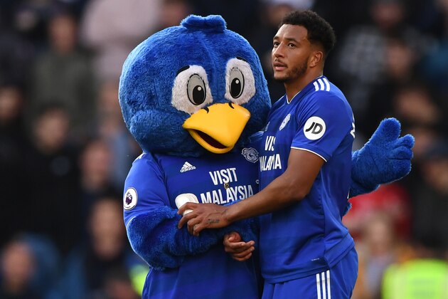 CARDIFF, WALES - MAY 04:  Bartley Bluebird, Cardiff City Mascot and Nathaniel Mendez-Laing of Cardiff City look dejected as their team are relegated following the result in the Premier League match between Cardiff City and Crystal Palace at Cardiff City Stadium on May 04, 2019 in Cardiff, United Kingdom. (Photo by Stu Forster/Getty Images)