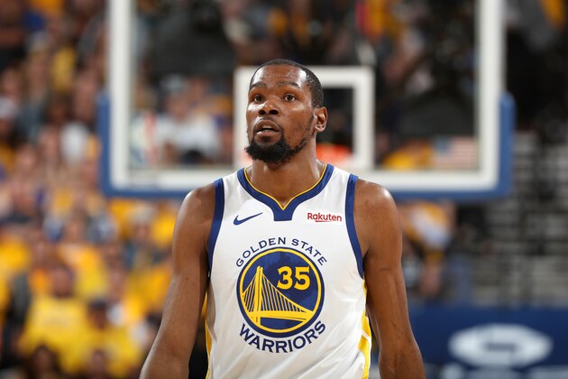 OAKLAND, CA - MAY 8: Kevin Durant #35 of the Golden State Warriors looks on against the Houston Rockets during Game Five of the Western Conference Semifinals of the 2019 NBA Playoffs on May 8, 2019 at ORACLE Arena in Oakland, California. NOTE TO USER: User expressly acknowledges and agrees that, by downloading and/or using this photograph, user is consenting to the terms and conditions of Getty Images License Agreement. Mandatory Copyright Notice: Copyright 2019 NBAE (Photo by Joe Murphy/NBAE via Getty Images)