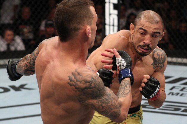 FORTALEZA, BRAZIL - FEBRUARY 02:  (R-L) Jose Aldo of Brazil punches Renato Moicano of Brazil in their featherweight fight during the UFC Fight Night event at CFO Centro de Formacao Olimpica on February 2, 2019 in Fortaleza, Brazil. (Photo by Buda Mendes/Zuffa LLC/Zuffa LLC via Getty Images)
