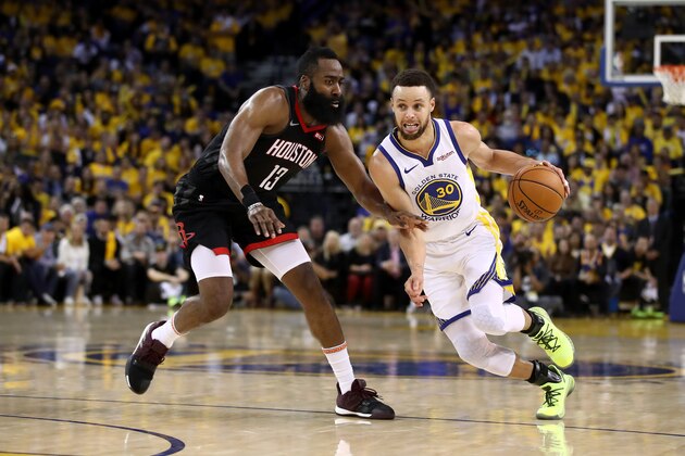OAKLAND, CALIFORNIA - MAY 08:   Stephen Curry #30 of the Golden State Warriors dribbles past James Harden #13 of the Houston Rockets during Game Five of the Western Conference Semifinals of the 2019 NBA Playoffs at ORACLE Arena on May 08, 2019 in Oakland, California.  NOTE TO USER: User expressly acknowledges and agrees that, by downloading and or using this photograph, User is consenting to the terms and conditions of the Getty Images License Agreement.  (Photo by Ezra Shaw/Getty Images)