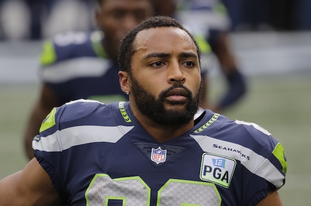 Seattle Seahawks wide receiver Doug Baldwin stretches before an NFL football game against the San Francisco 49ers, Sunday, Dec. 2, 2018, in Seattle. (AP Photo/Elaine Thompson)