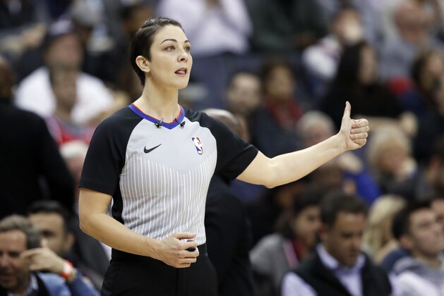 Referee Lauren Holtkamp gives a thumbs up during the first half of an NBA basketball game between the Washington Wizards and the Utah Jazz, Wednesday, Jan. 10, 2018, in Washington. (AP Photo/Alex Brandon)
