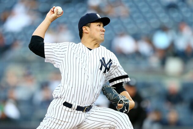 NEW YORK, NEW YORK - MAY 07:  Masahiro Tanaka #19 of the New York Yankees pitches in the first inning against the Seattle Mariners at Yankee Stadium on May 07, 2019 in New York City.New York Yankees defeated the Seattle Mariners 5-4. (Photo by Mike Stobe/Getty Images)
