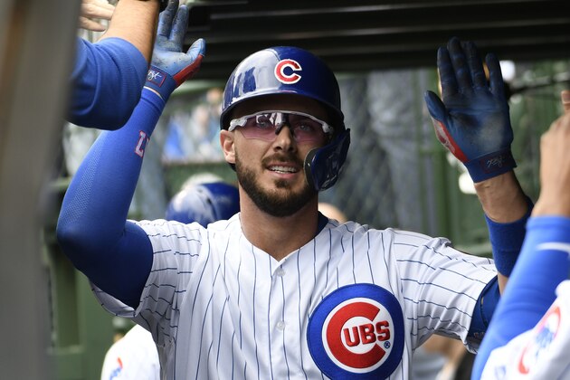 CHICAGO, ILLINOIS - MAY 09: Kris Bryant #17 of the Chicago Cubs is greeted after hitting a home run against the Miami Marlins during the first inning at Wrigley Field on May 09, 2019 in Chicago, Illinois. (Photo by David Banks/Getty Images)