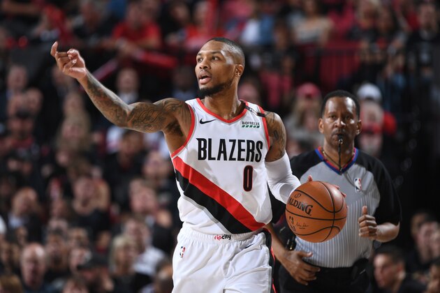 PORTLAND, OR - MAY 9: Damian Lillard #0 of the Portland Trail Blazers handles the ball against the Denver Nuggets during Game Six of the Western Conference Semifinals of the 2019 NBA Playoffs on May 9, 2019 at the Moda Center in Portland, Oregon. NOTE TO USER: User expressly acknowledges and agrees that, by downloading and/or using this photograph, user is consenting to the terms and conditions of the Getty Images License Agreement. Mandatory Copyright Notice: Copyright 2019 NBAE (Photo by Garrett Ellwood/NBAE via Getty Images)