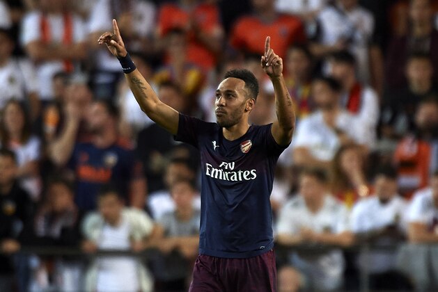 VALENCIA, SPAIN - MAY 09: Pierre-Emerick Aubameyang of Arsenal celebrates after scoring his team's fourth goal during the UEFA Europa League Semi Final Second Leg match between Valencia and Arsenal at Estadio Mestalla on May 09, 2019 in Valencia, Spain. (Photo by Quality Sport Images/Getty Images)