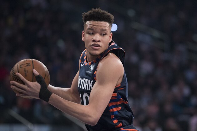 New York Knicks forward Kevin Knox grabs a rebound during the first half of an NBA basketball game against the Washington Wizards, Sunday, April 7, 2019, at Madison Square Garden in New York. (AP Photo/Mary Altaffer)