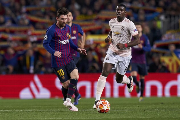 BARCELONA, SPAIN - APRIL 16: Lionel Messi of Barcelona battles for the ball with Paul Pogba of Manchester United  during the UEFA Champions League Quarter Final second leg match between FC Barcelona and Manchester United at Camp Nou on April 16, 2019 in Barcelona, Spain. (Photo by Quality Sport Images/Getty Images)