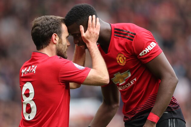 MANCHESTER, ENGLAND - APRIL 28: Juan Mata of Manchester United celebrates after scoring a goal to make it 1-0 with Paul Pogba during the Premier League match between Manchester United and Chelsea FC at Old Trafford on April 28, 2019 in Manchester, United Kingdom. (Photo by Matthew Ashton - AMA/Getty Images)