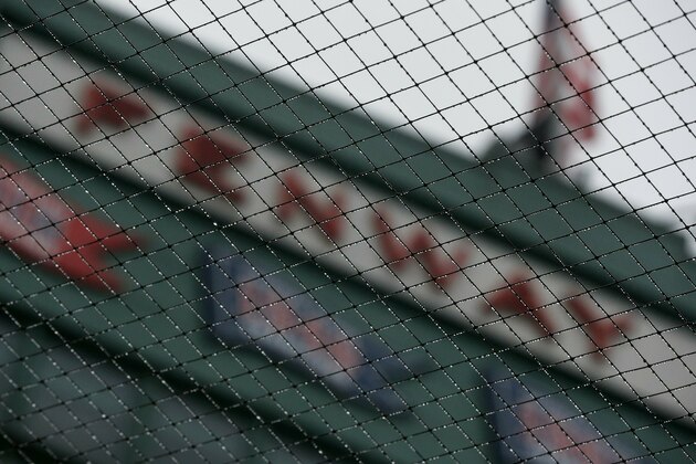 Mist collects on the netting at Fenway Park in Boston, Friday, April 26, 2019. The scheduled baseball game between the Boston Red Sox and the Tampa Bay Rays was postponed due to inclement weather. (AP Photo/Michael Dwyer)