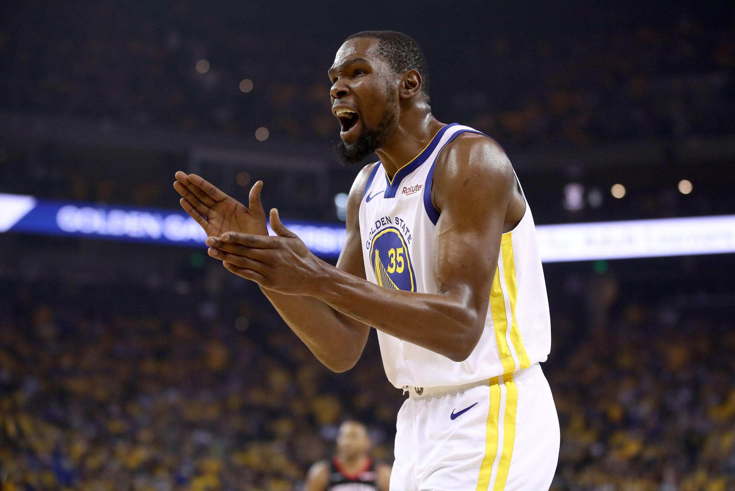 OAKLAND, CALIFORNIA - MAY 08: Kevin Durant #35 of the Golden State Warriors reacts during their game against the Houston Rockets in Game Five of the Western Conference Semifinals of the 2019 NBA Playoffs at ORACLE Arena on May 08, 2019 in Oakland, California. NOTE TO USER: User expressly acknowledges and agrees that, by downloading and or using this photograph, User is consenting to the terms and conditions of the Getty Images License Agreement. (Photo by Ezra Shaw/Getty Images) OAKLAND, CALIFORNIA - MAY 08: Kevin Durant #35 of the Golden State Warriors reacts during their game against the Houston Rockets in Game Five of the Western Conference Semifinals of the 2019 NBA Playoffs at ORACLE Arena on May 08, 2019 in Oakland, California. NOTE TO USER: User expressly acknowledges and agrees that, by downloading and or using this photograph, User is consenting to the terms and conditions of the Getty Images License Agreement. (Photo by Ezra Shaw/Getty Images)