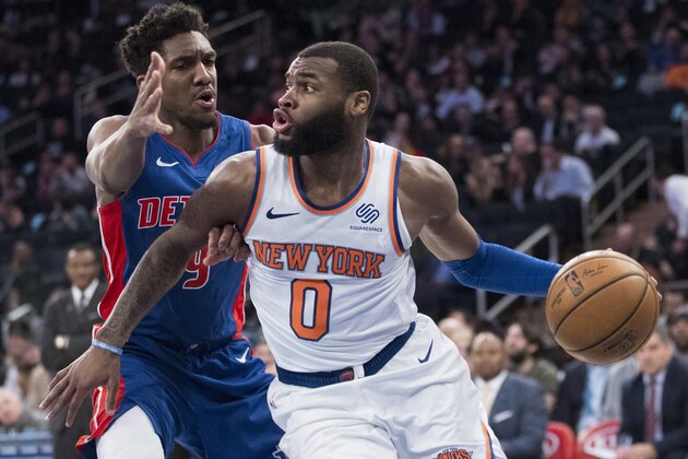 New York Knicks guard Kadeem Allen (0) drives against Detroit Pistons guard Langston Galloway (9) during the second half of an NBA basketball game Wednesday, April 10, 2019, at Madison Square Garden in New York. The Pistons won 115-89. (AP Photo/Mary Altaffer)