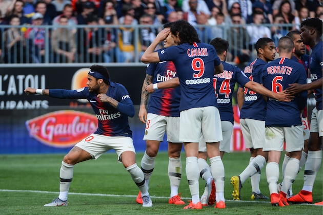 Paris Saint-Germain's Brazilian forward Neymar (L) celebrates with teammates after scoring his team first goal during the French L1 football match between Angers (SCO) and Paris Saint-Germain (PSG), on May 11, 2019, at the Raymond-Kopa Stadium, in Angers. (Photo by Jean-François MONIER / AFP)        (Photo credit should read JEAN-FRANCOIS MONIER/AFP/Getty Images)