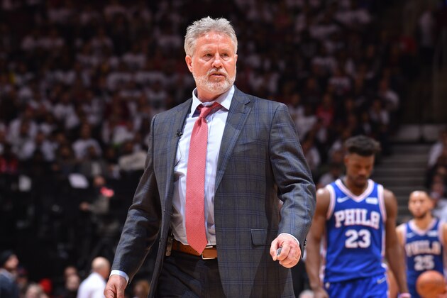 TORONTO, CANADA - APRIL 29: Head Coach Brett Brown of the Philadelphia 76ers looks on against the Toronto Raptors during Game Two of the Eastern Conference Semifinals of the 2019 NBA Playoffs on April 29, 2019 at Scotiabank Arena in Toronto, Ontario, Canada. NOTE TO USER: User expressly acknowledges and agrees that, by downloading and/or using this photograph, user is consenting to the terms and conditions of the Getty Images License Agreement. Mandatory Copyright Notice: Copyright 2019 NBAE (Photo by Jesse D. Garrabrant/NBAE via Getty Images)